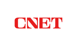 The image shows the CNET logo with the letters CNET in bold, red, modern font on a white background.