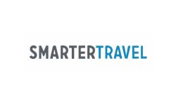 Logo with the words SMARTER TRAVEL in all capital letters; SMARTER is in dark gray and TRAVEL is in blue, set on a white background.